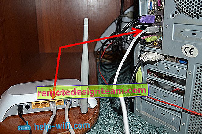 Foto: menyambungkan komputer ke penghala melalui kabel rangkaian