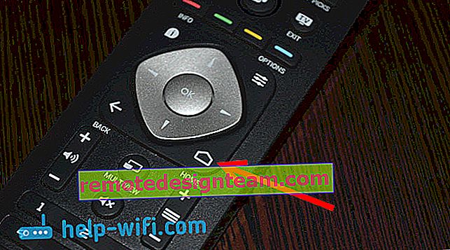 Foto tombol start Android TV di TV Philips